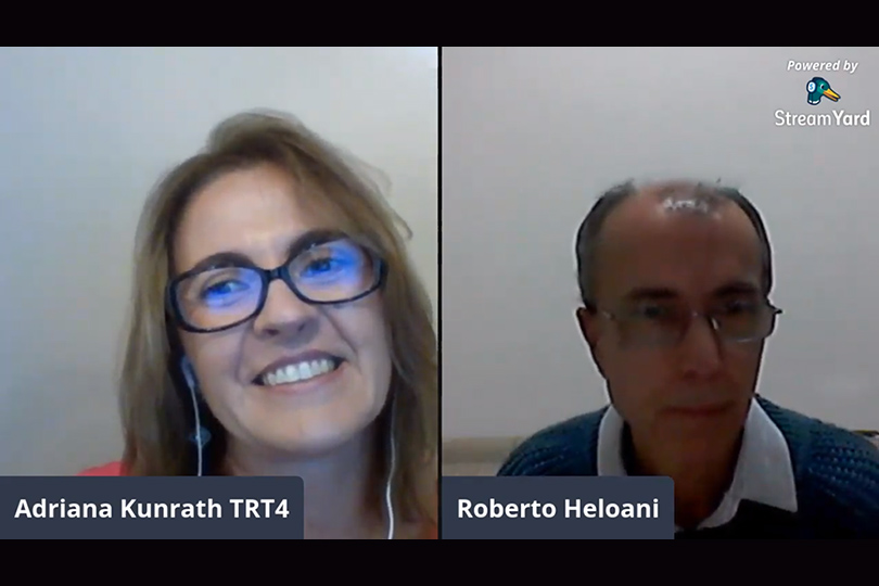 Imagem da transmissão, com a juíza Adriana Kunrath e o professor Roberto Heloani
