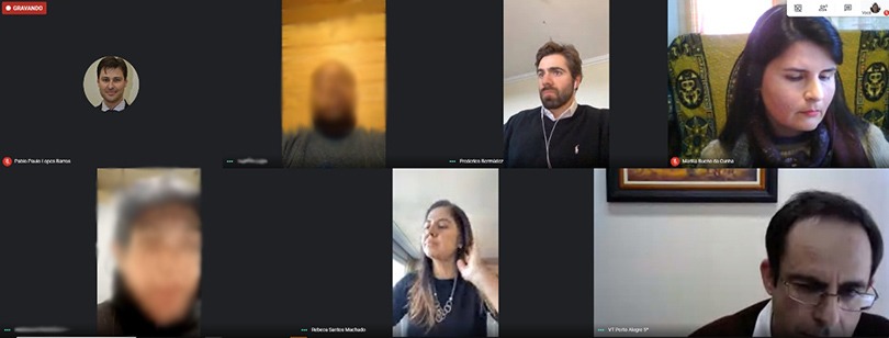 Foto da videoconferência com imagens de alguns participantes