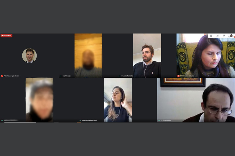 Foto da videoconferência com imagens de alguns participantes