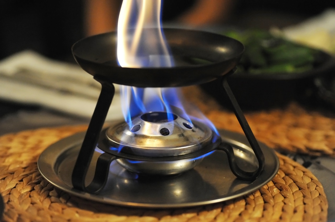 Foto da chama de um aparelho de fondue Foto da chama de um aparelho de fondue