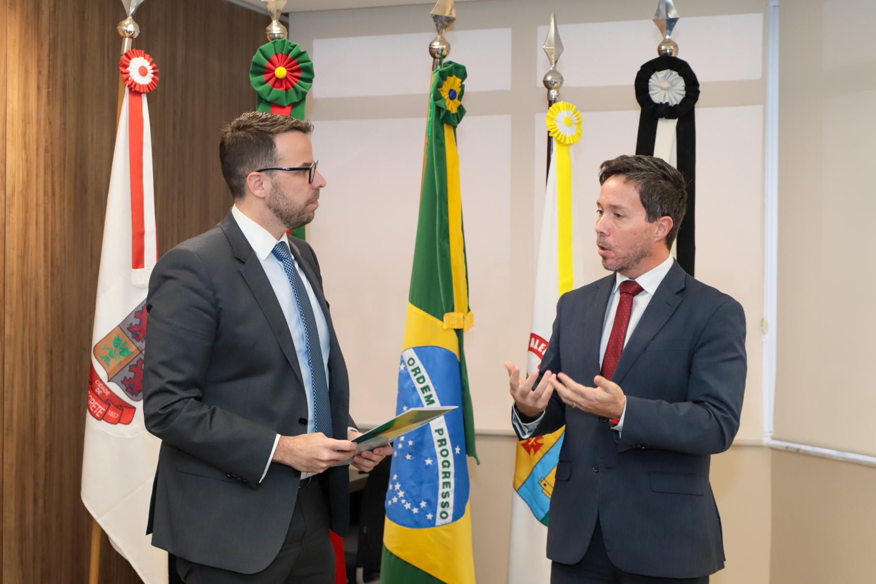 Foto do juiz Rodrigo Trindade e do procurador Rafael Foresti Pego